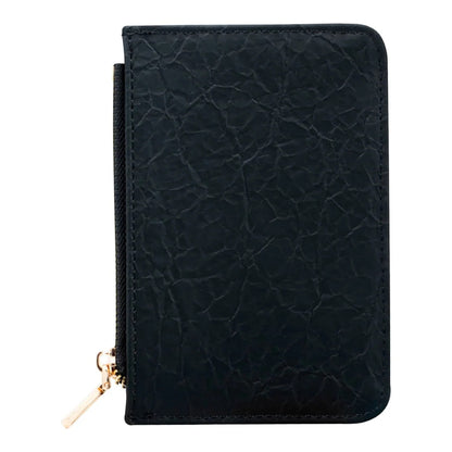 Regalos Ejecutivos Ortiz black synthetic cardholder with textured finish and gold zipper detail.