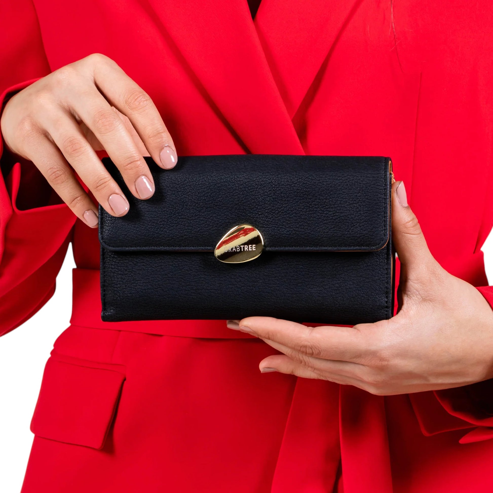Regalos Ejecutivos Ortiz black textured synthetic wallet with gold organic clasp and red blazer