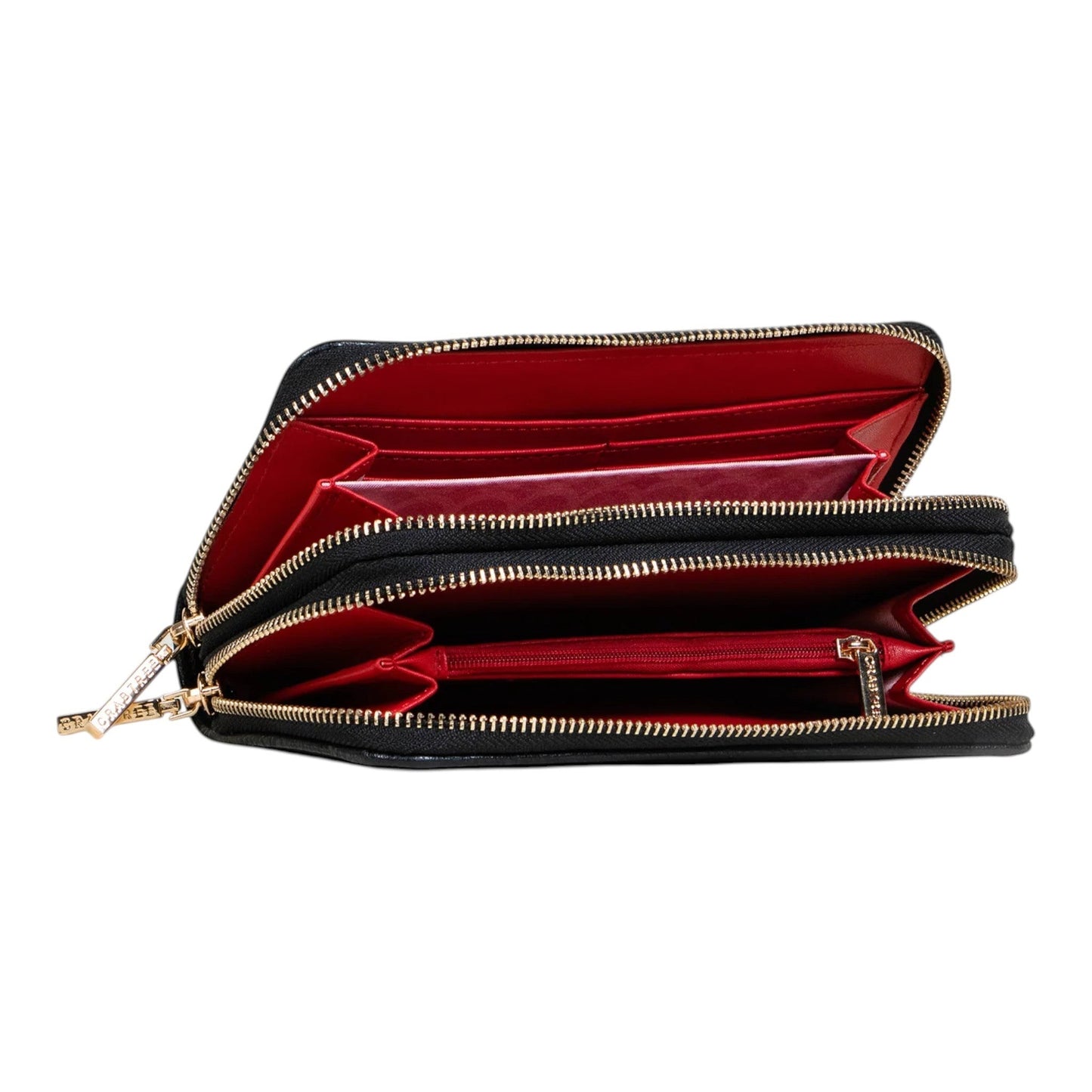 Regalos Ejecutivos Ortiz black faux leather wallet with red interior and double zipper closure.