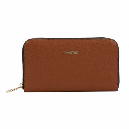 Regalos Ejecutivos Ortiz Crabtree brown pebbled leather zip-around wallet with gold hardware.